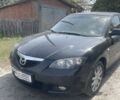 Черный Мазда 3, объемом двигателя 1.6 л и пробегом 210 тыс. км за 6000 $, фото 1 на Automoto.ua