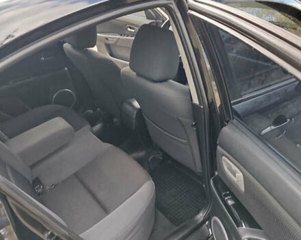 Черный Мазда 3, объемом двигателя 2 л и пробегом 199 тыс. км за 6800 $, фото 9 на Automoto.ua