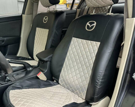 Черный Мазда 3, объемом двигателя 2 л и пробегом 200 тыс. км за 2700 $, фото 9 на Automoto.ua