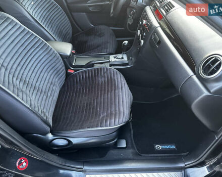 Чорний Мазда 3, об'ємом двигуна 1.6 л та пробігом 198 тис. км за 5499 $, фото 45 на Automoto.ua
