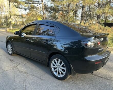 Черный Мазда 3, объемом двигателя 2 л и пробегом 192 тыс. км за 6500 $, фото 1 на Automoto.ua