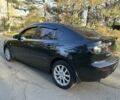 Черный Мазда 3, объемом двигателя 2 л и пробегом 192 тыс. км за 6500 $, фото 1 на Automoto.ua