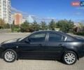 Черный Мазда 3, объемом двигателя 2 л и пробегом 175 тыс. км за 6000 $, фото 3 на Automoto.ua