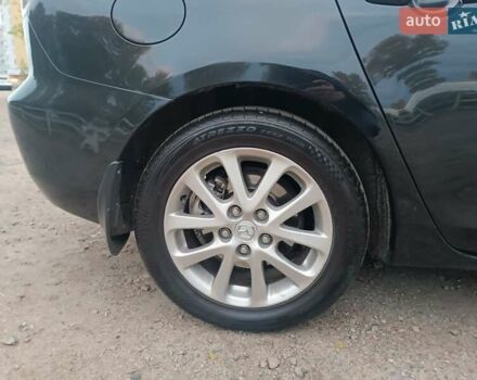 Черный Мазда 3, объемом двигателя 2 л и пробегом 221 тыс. км за 5700 $, фото 12 на Automoto.ua