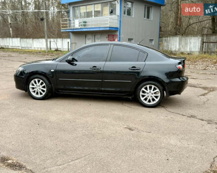 Чорний Мазда 3, об'ємом двигуна 1.6 л та пробігом 183 тис. км за 6150 $, фото 7 на Automoto.ua