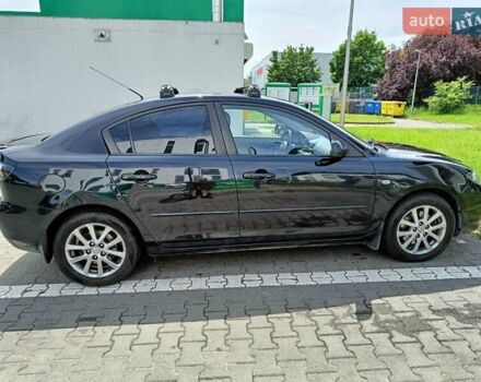 Чорний Мазда 3, об'ємом двигуна 2 л та пробігом 143 тис. км за 5500 $, фото 4 на Automoto.ua