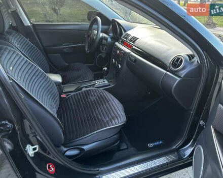 Чорний Мазда 3, об'ємом двигуна 1.6 л та пробігом 198 тис. км за 5499 $, фото 35 на Automoto.ua