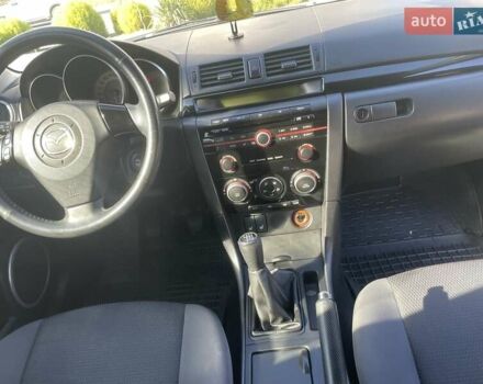 Черный Мазда 3, объемом двигателя 2 л и пробегом 175 тыс. км за 6000 $, фото 13 на Automoto.ua