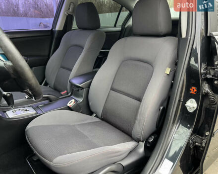 Черный Мазда 3, объемом двигателя 1.6 л и пробегом 256 тыс. км за 5450 $, фото 22 на Automoto.ua