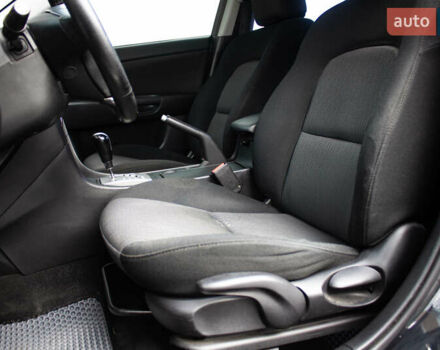 Черный Мазда 3, объемом двигателя 1.6 л и пробегом 185 тыс. км за 6350 $, фото 11 на Automoto.ua