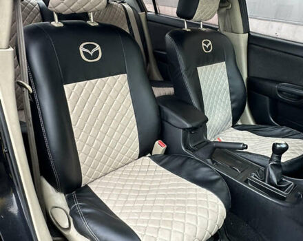 Черный Мазда 3, объемом двигателя 2 л и пробегом 200 тыс. км за 2700 $, фото 18 на Automoto.ua