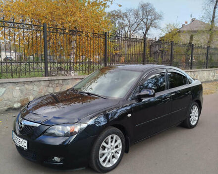 Черный Мазда 3, объемом двигателя 2 л и пробегом 199 тыс. км за 6800 $, фото 1 на Automoto.ua