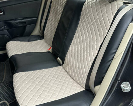 Черный Мазда 3, объемом двигателя 2 л и пробегом 200 тыс. км за 2700 $, фото 12 на Automoto.ua