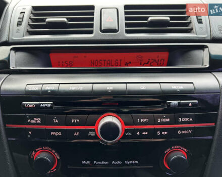 Черный Мазда 3, объемом двигателя 1.6 л и пробегом 256 тыс. км за 5450 $, фото 16 на Automoto.ua