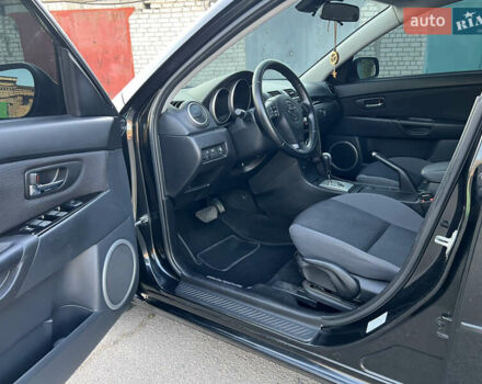 Чорний Мазда 3, об'ємом двигуна 2 л та пробігом 167 тис. км за 7500 $, фото 8 на Automoto.ua