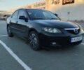 Черный Мазда 3, объемом двигателя 1.6 л и пробегом 325 тыс. км за 5500 $, фото 1 на Automoto.ua
