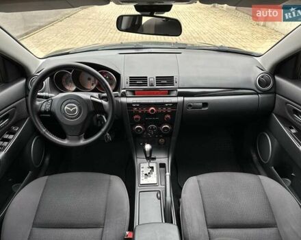Черный Мазда 3, объемом двигателя 1.6 л и пробегом 130 тыс. км за 7700 $, фото 28 на Automoto.ua