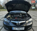 Чорний Мазда 3, об'ємом двигуна 1.6 л та пробігом 198 тис. км за 5499 $, фото 53 на Automoto.ua