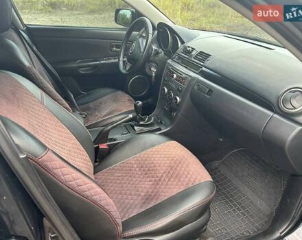 Чорний Мазда 3, об'ємом двигуна 1.6 л та пробігом 233 тис. км за 5500 $, фото 2 на Automoto.ua
