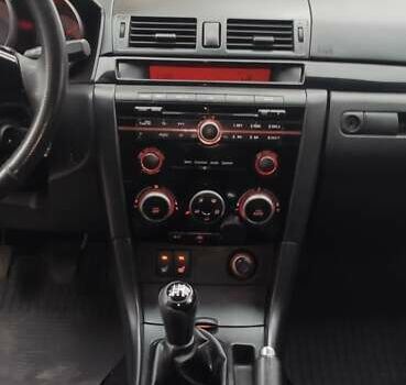 Черный Мазда 3, объемом двигателя 1.6 л и пробегом 146 тыс. км за 4800 $, фото 12 на Automoto.ua