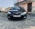 Черный Мазда 3, объемом двигателя 1.6 л и пробегом 207 тыс. км за 5600 $, фото 1 на Automoto.ua