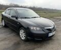 Черный Мазда 3, объемом двигателя 1.6 л и пробегом 225 тыс. км за 4250 $, фото 1 на Automoto.ua