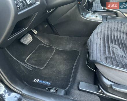 Чорний Мазда 3, об'ємом двигуна 1.6 л та пробігом 198 тис. км за 5499 $, фото 37 на Automoto.ua