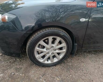 Черный Мазда 3, объемом двигателя 2 л и пробегом 221 тыс. км за 5700 $, фото 14 на Automoto.ua