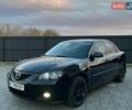 Черный Мазда 3, объемом двигателя 2 л и пробегом 250 тыс. км за 5500 $, фото 1 на Automoto.ua
