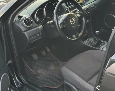 Черный Мазда 3, объемом двигателя 1.6 л и пробегом 225 тыс. км за 5900 $, фото 7 на Automoto.ua