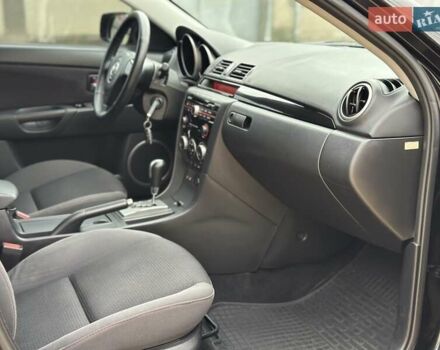 Черный Мазда 3, объемом двигателя 1.6 л и пробегом 130 тыс. км за 7700 $, фото 35 на Automoto.ua