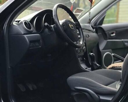 Чорний Мазда 3, об'ємом двигуна 1.6 л та пробігом 260 тис. км за 5950 $, фото 26 на Automoto.ua