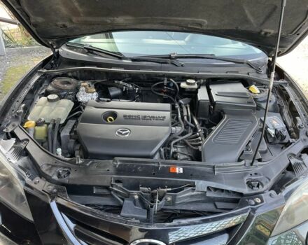 Черный Мазда 3, объемом двигателя 2 л и пробегом 246 тыс. км за 5800 $, фото 3 на Automoto.ua