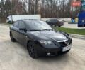 Чорний Мазда 3, об'ємом двигуна 1.6 л та пробігом 146 тис. км за 6800 $, фото 1 на Automoto.ua
