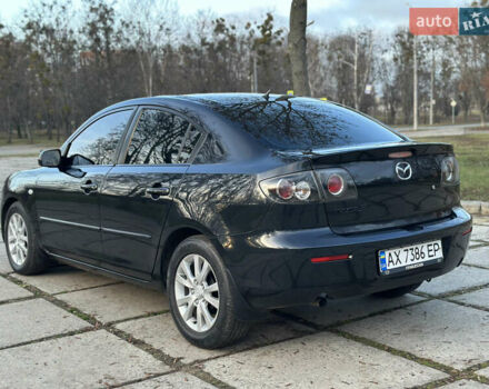 Чорний Мазда 3, об'ємом двигуна 1.6 л та пробігом 198 тис. км за 5499 $, фото 12 на Automoto.ua