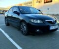 Чорний Мазда 3, об'ємом двигуна 1.6 л та пробігом 325 тис. км за 5500 $, фото 1 на Automoto.ua