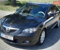 Черный Мазда 3, объемом двигателя 2 л и пробегом 187 тыс. км за 6400 $, фото 2 на Automoto.ua