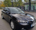 Черный Мазда 3, объемом двигателя 2 л и пробегом 199 тыс. км за 6800 $, фото 1 на Automoto.ua