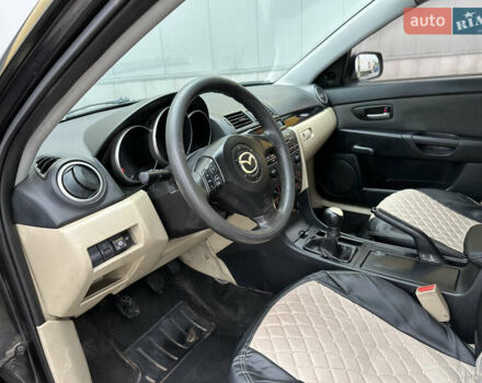 Черный Мазда 3, объемом двигателя 2 л и пробегом 200 тыс. км за 2700 $, фото 8 на Automoto.ua