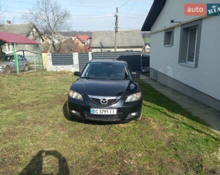 Чорний Мазда 3, об'ємом двигуна 1.6 л та пробігом 170 тис. км за 6500 $, фото 1 на Automoto.ua