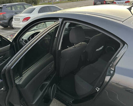 Черный Мазда 3, объемом двигателя 1.6 л и пробегом 225 тыс. км за 5900 $, фото 9 на Automoto.ua