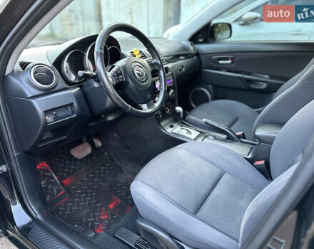 Чорний Мазда 3, об'ємом двигуна 1.6 л та пробігом 183 тис. км за 6500 $, фото 32 на Automoto.ua