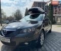 Черный Мазда 3, объемом двигателя 2 л и пробегом 240 тыс. км за 5950 $, фото 1 на Automoto.ua