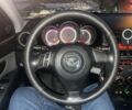 Черный Мазда 3, объемом двигателя 2 л и пробегом 246 тыс. км за 5800 $, фото 9 на Automoto.ua