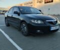 Черный Мазда 3, объемом двигателя 1.6 л и пробегом 325 тыс. км за 5200 $, фото 1 на Automoto.ua