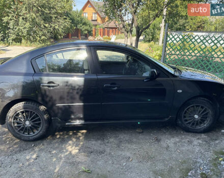 Чорний Мазда 3, об'ємом двигуна 2 л та пробігом 246 тис. км за 5800 $, фото 2 на Automoto.ua