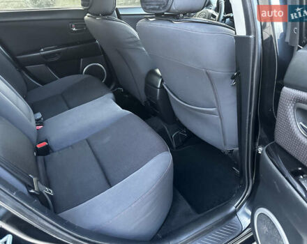 Чорний Мазда 3, об'ємом двигуна 1.6 л та пробігом 198 тис. км за 5499 $, фото 34 на Automoto.ua