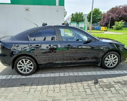 Чорний Мазда 3, об'ємом двигуна 2 л та пробігом 143 тис. км за 5500 $, фото 4 на Automoto.ua