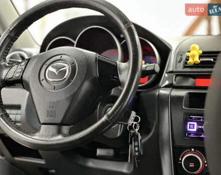Чорний Мазда 3, об'ємом двигуна 1.6 л та пробігом 183 тис. км за 6500 $, фото 22 на Automoto.ua