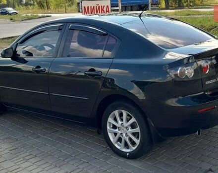 Черный Мазда 3, объемом двигателя 2 л и пробегом 187 тыс. км за 6400 $, фото 9 на Automoto.ua